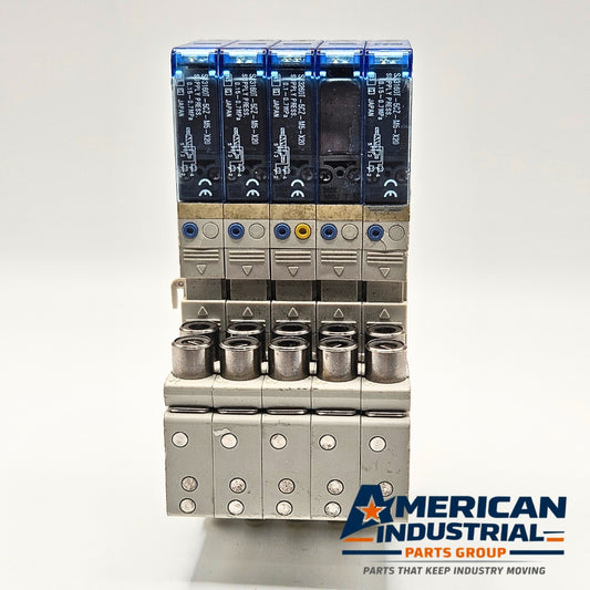 SMC SJ3160T-5CZ-M5-X20 pneumatic solenoid valve manifold lot of 5 front view, industrial automation MRO pneumatic valve assembly. American Industrial Parts Group.