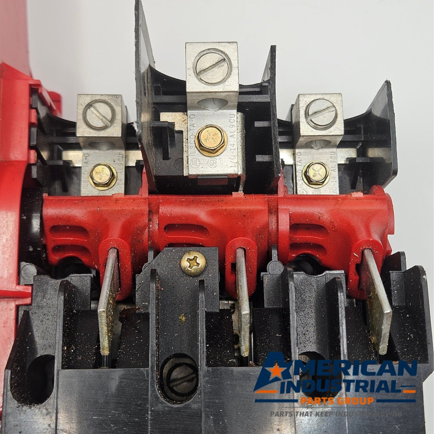 Unbranded disconnect switch interior assembly for industrial automation panels. American Industrial Parts Group.
