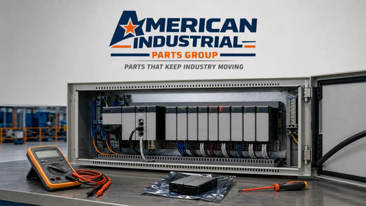 Faulty PLC module with a red status light, diagnostic multimeter, and replacement module prepared by American Industrial Parts Group.