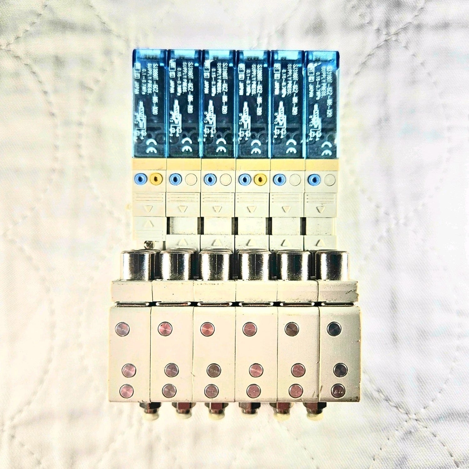 Pneumatic valve manifold assembly for industrial automation and MRO repair