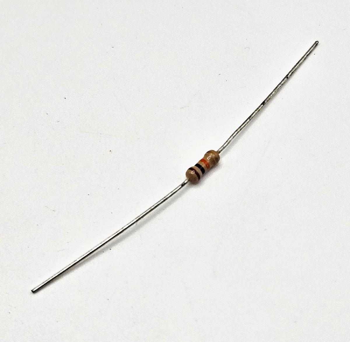 10K ohm 10% axial lead fixed resistor brown black orange silver through-hole for circuit board repair and vintage electronics restoration