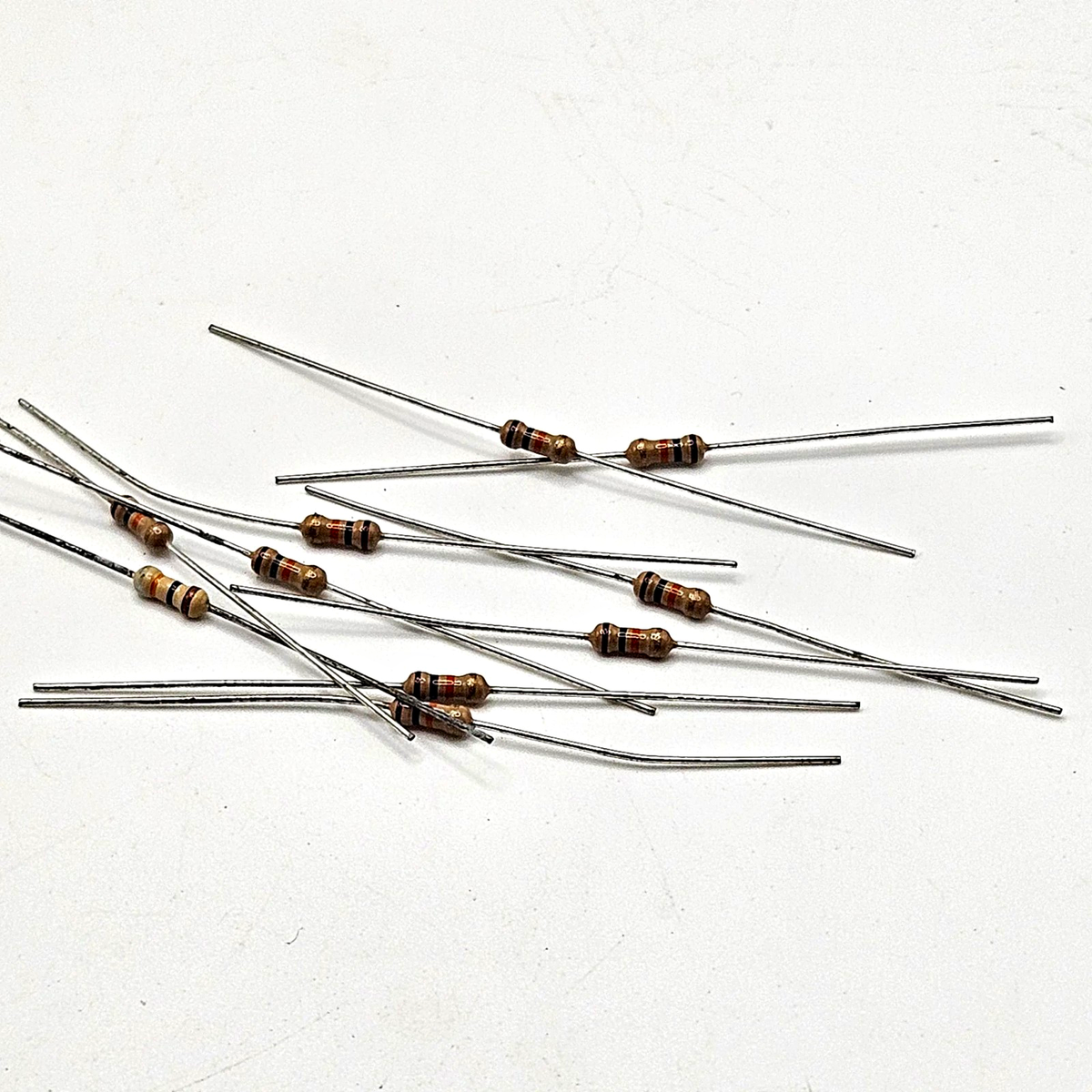 Lot of 10 10K ohm 10% axial lead fixed resistors brown black orange silver through-hole for circuit board repair and vintage electronics restoration