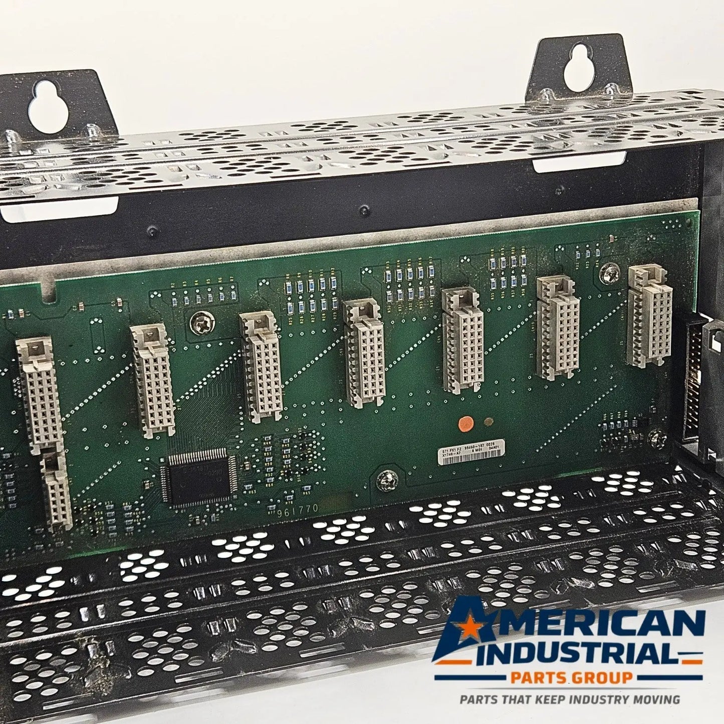 Allen-Bradley 1746-A7 PLC chassis and 1746-P2 supply for programmable logic controller systems. American Industrial Parts Group.