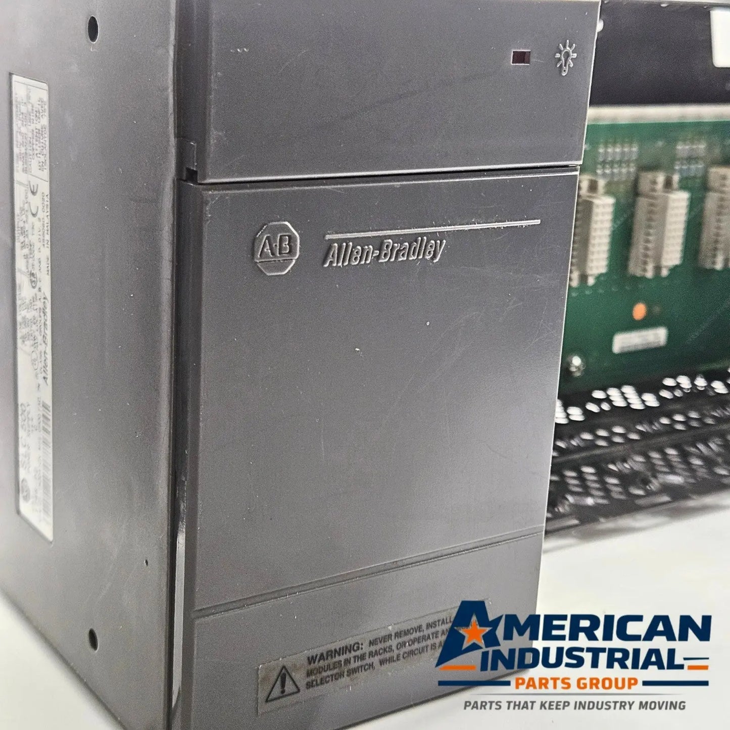 Allen-Bradley 1746-A7 PLC rack and 1746-P2 power supply used in Rockwell SLC 500 automation systems. American Industrial Parts Group.
