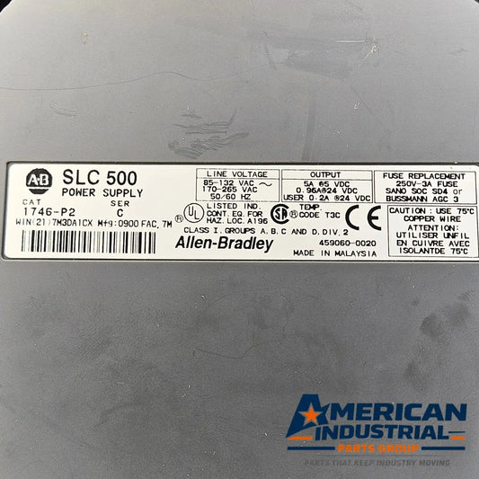 Allen-Bradley 1746-A7 SLC 500 chassis and 1746-P2 power supply used in PLC control panels. American Industrial Parts Group.