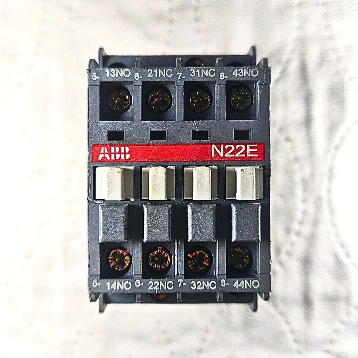 ABB N22E auxiliary contact block front view, industrial automation MRO contactor accessory component. American Industrial Parts Group.