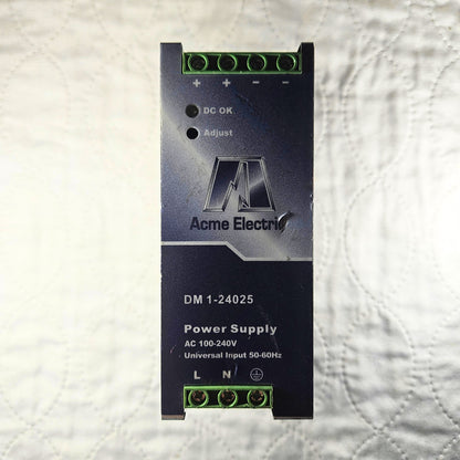 Acme Electric DM 1-24025 power supply 24VDC 2.5A 100-240VAC for industrial control panels and automation systems