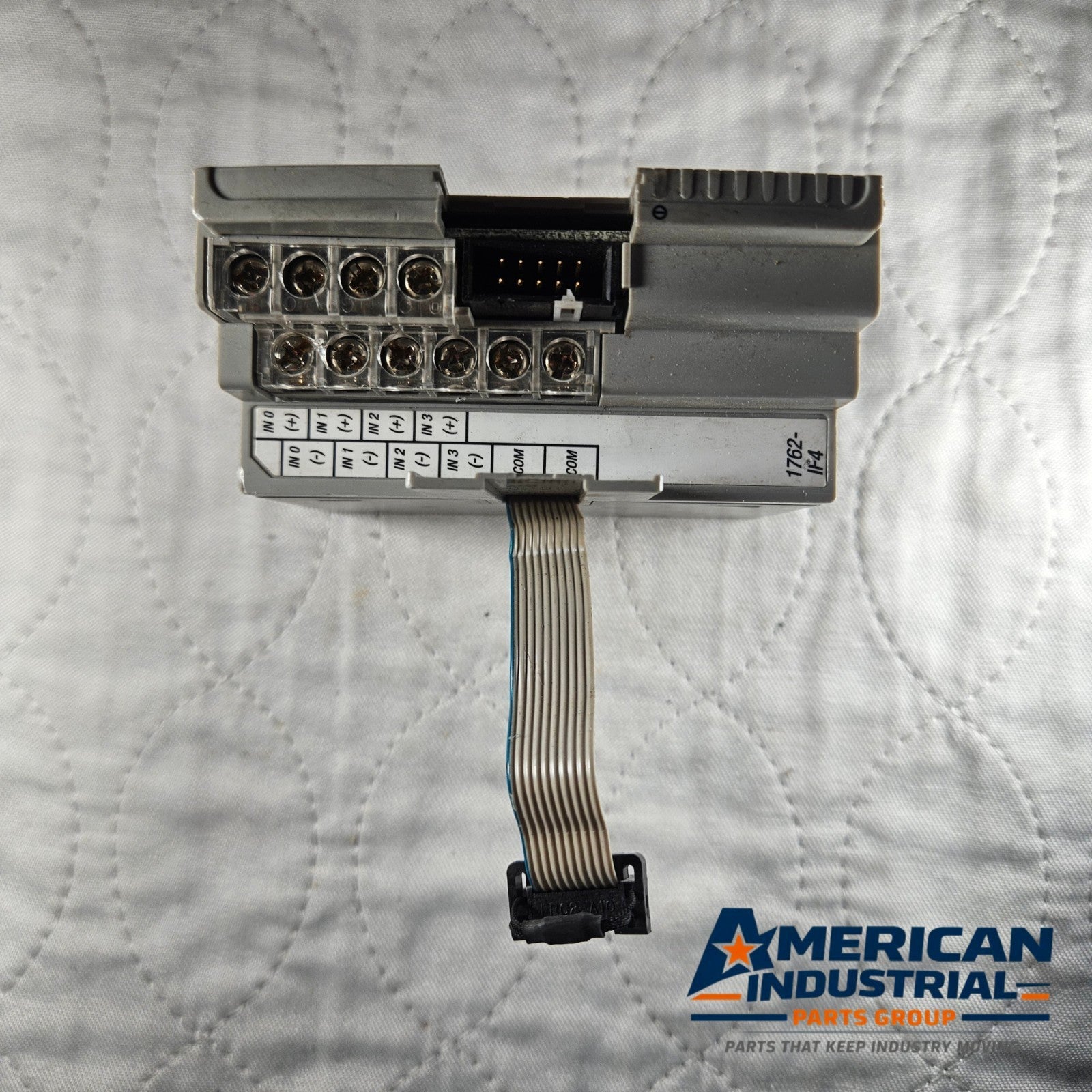 Allen-Bradley 1762-IF4 analog I/O module for factory automation spare parts. American Industrial Parts Group.