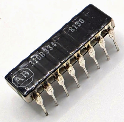 Allen-Bradley 316B334 330K ohm isolated resistor network DIP-16 from American Industrial Parts Group