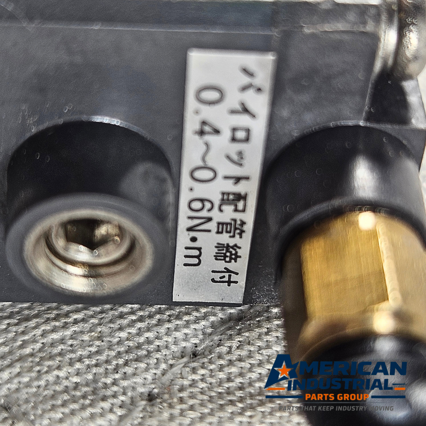 CKD AMD22 4V2 pneumatic solenoid air valve side view, industrial automation MRO pneumatic valve component. American Industrial Parts Group.
