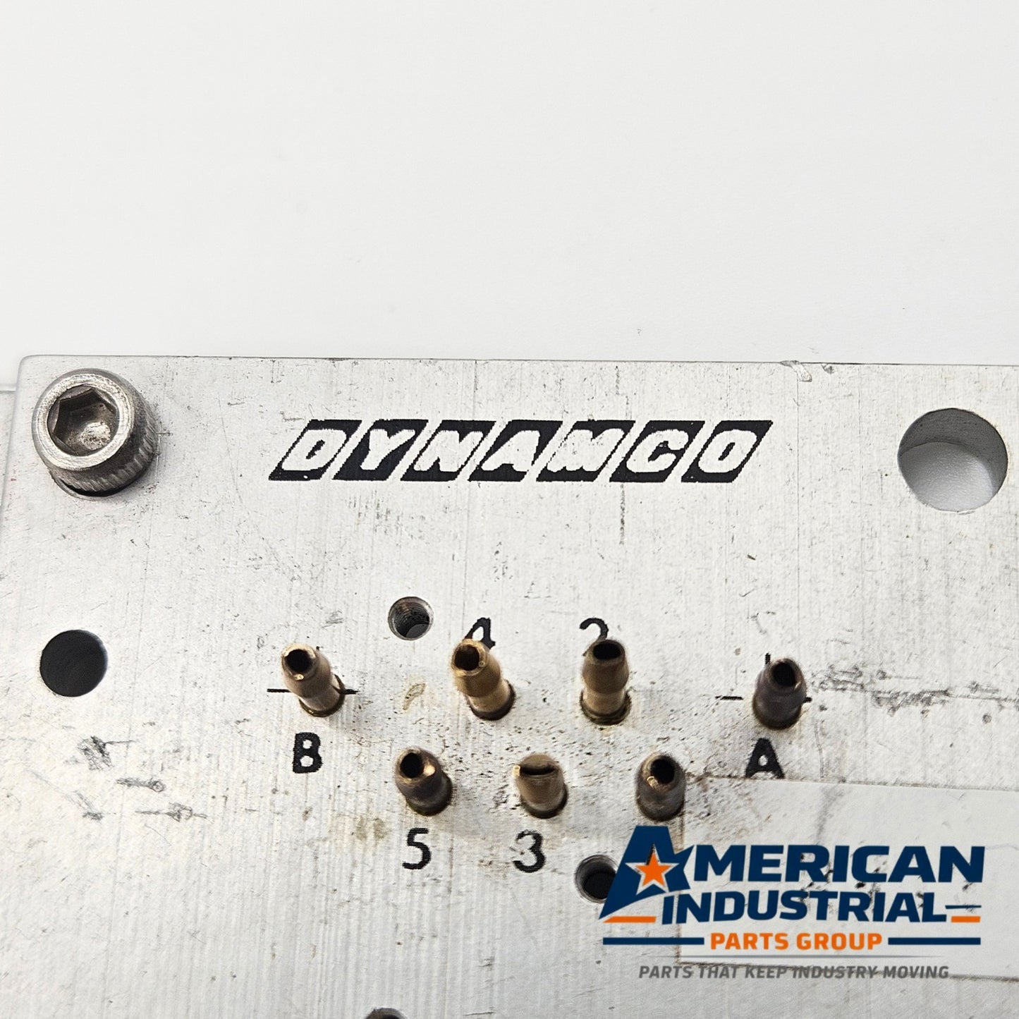 Dynamco 2436-O solenoid valve manifold plate for MRO pneumatic applications. American Industrial Parts Group.