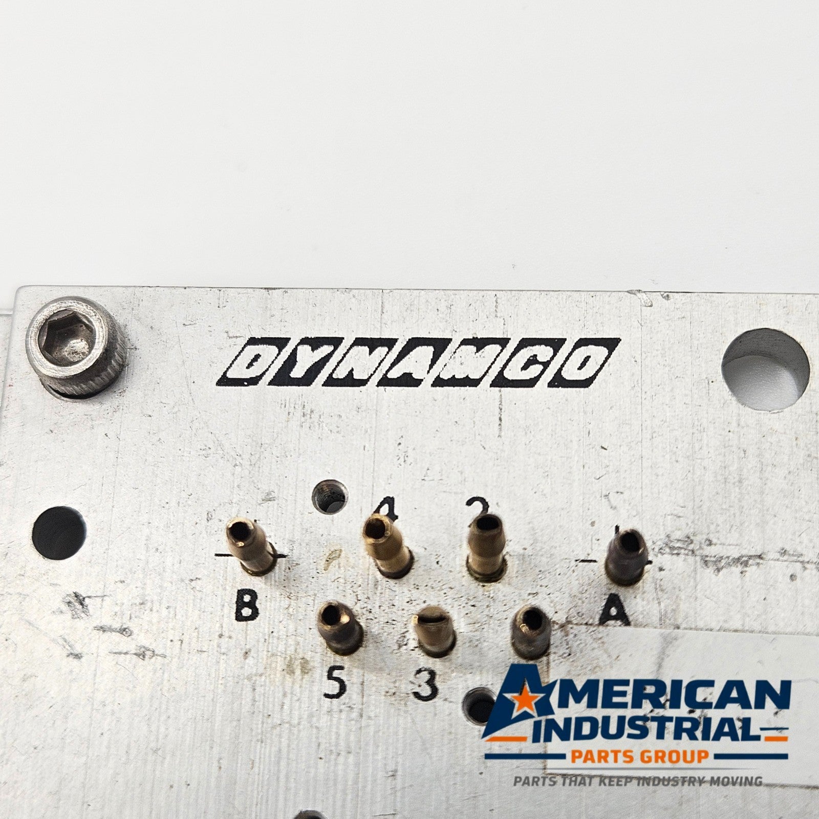 Dynamco 2436-O solenoid valve manifold plate for MRO pneumatic applications. American Industrial Parts Group.