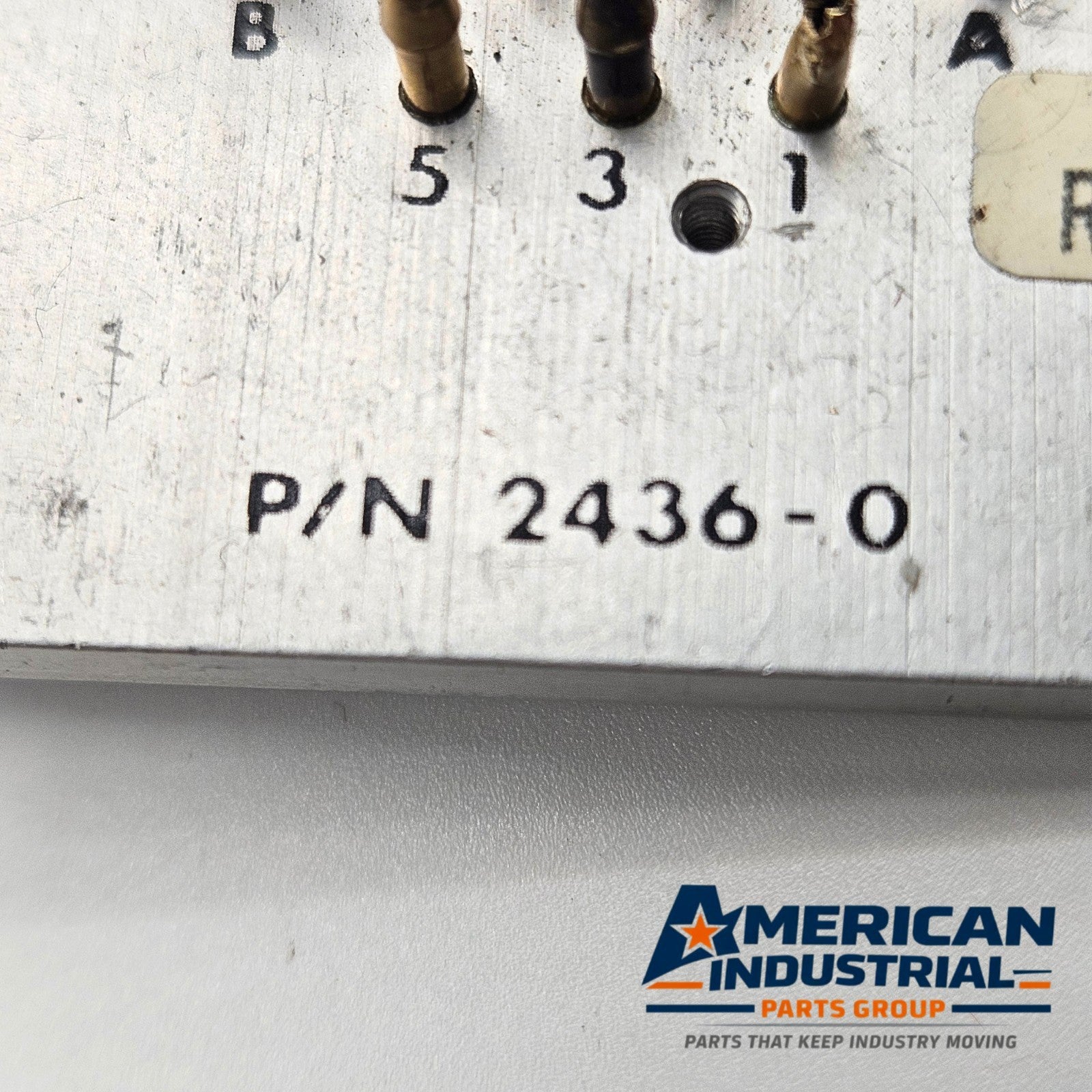 Dynamco 2436-O pneumatic valve subplate for machine control equipment. American Industrial Parts Group.