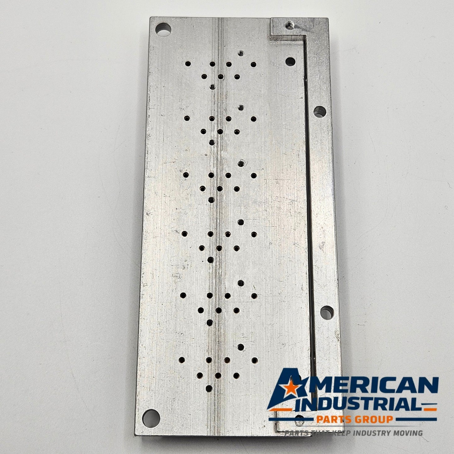 Dynamco 2436-O pneumatic solenoid manifold component for automation spare parts. American Industrial Parts Group.