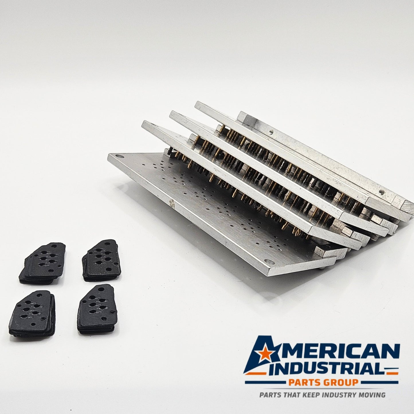 Dynamco 2436-O valve manifold plate used in industrial air control systems. American Industrial Parts Group.