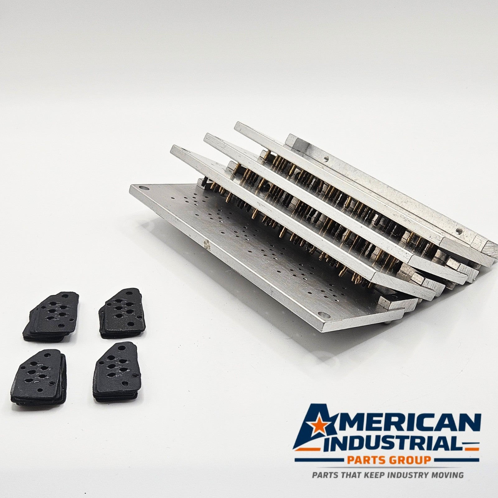 Dynamco 2436-O valve manifold plate used in industrial air control systems. American Industrial Parts Group.