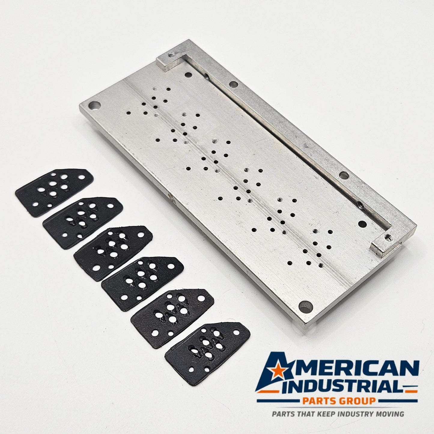 Dynamco 2436-O solenoid manifold subplate for MRO replacement inventory. American Industrial Parts Group.