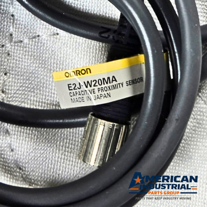 Omron E2J-W20MA capacitive proximity sensor 20mm range for industrial automation and machine sensing applications