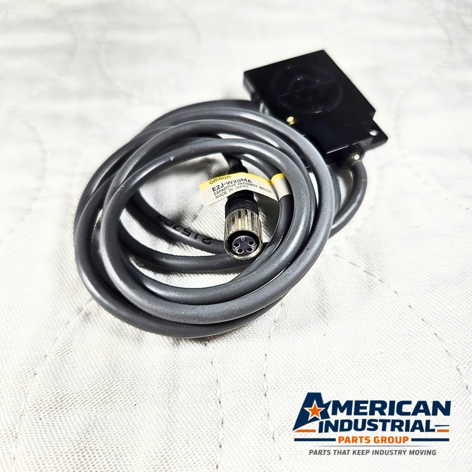 Omron E2J-W20MA capacitive proximity sensor 20mm range for industrial automation and machine sensing applications