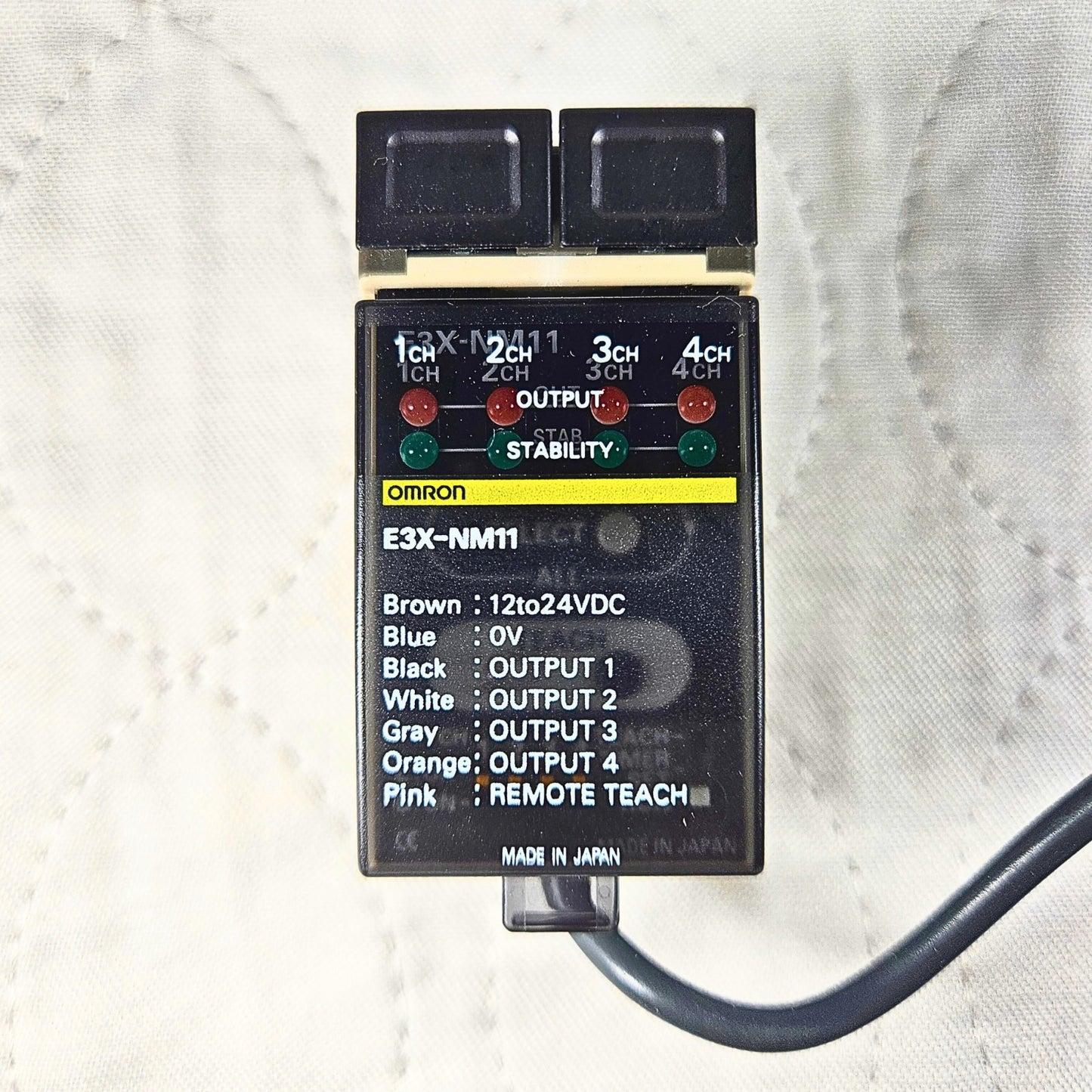 Omron E3X-NM11 fiber optic sensor amplifier 4-channel 12-24VDC for industrial automation systems and machine sensing