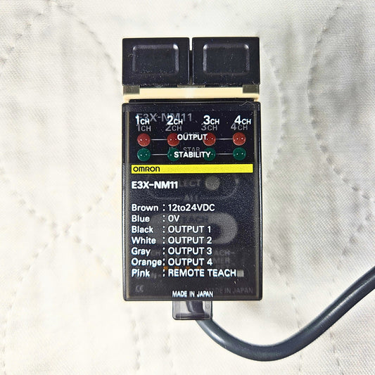 Omron E3X-NM11 fiber optic sensor amplifier 4-channel 12-24VDC for industrial automation systems and machine sensing