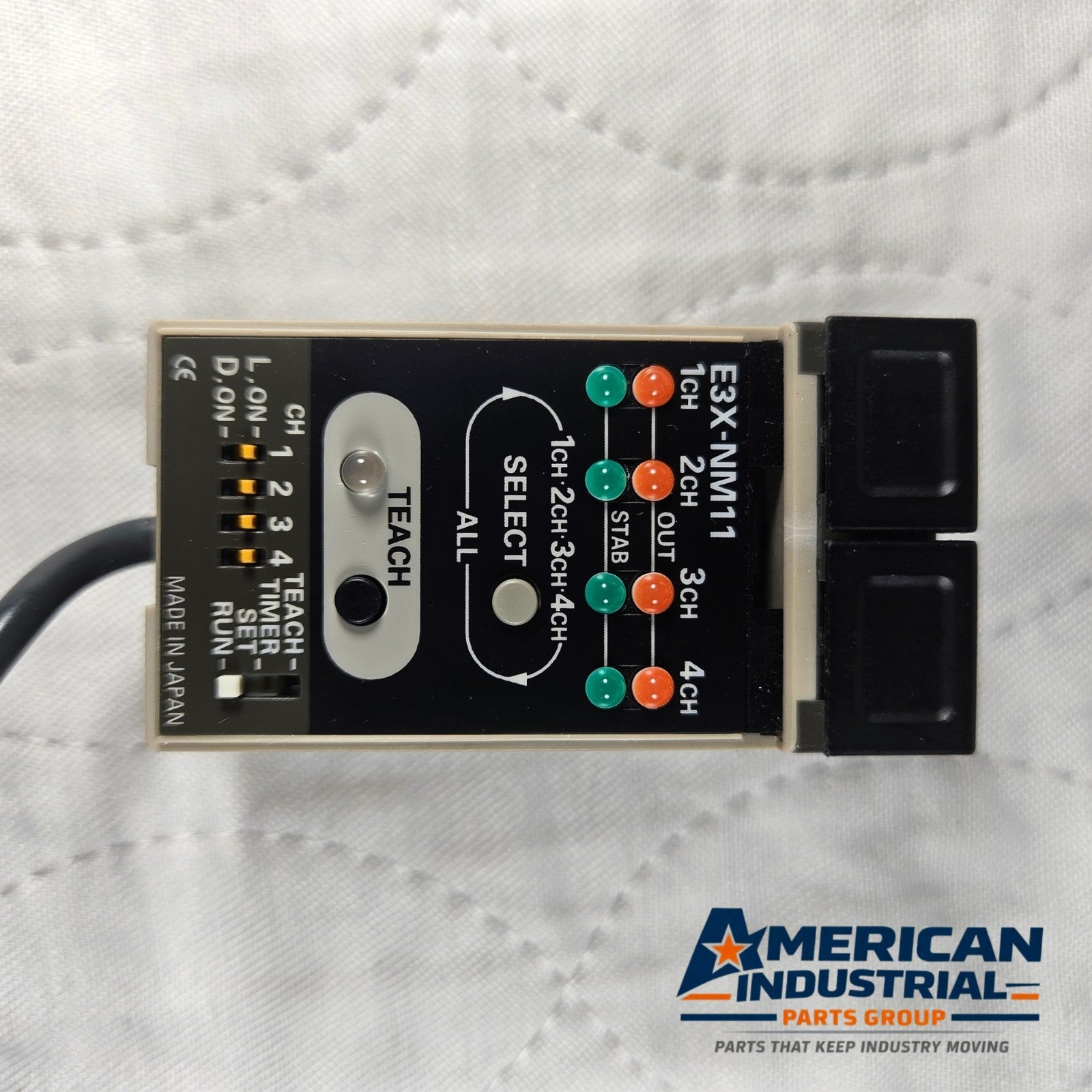 Omron E3X-NM11 fiber optic sensor amplifier 4-channel 12-24VDC for industrial automation systems and machine sensing