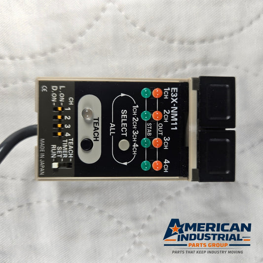 Omron E3X-NM11 fiber optic sensor amplifier 4-channel 12-24VDC for industrial automation systems and machine sensing