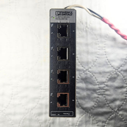 Phoenix Contact FL SFN 5TX ethernet module front view. American Industrial Parts Group.