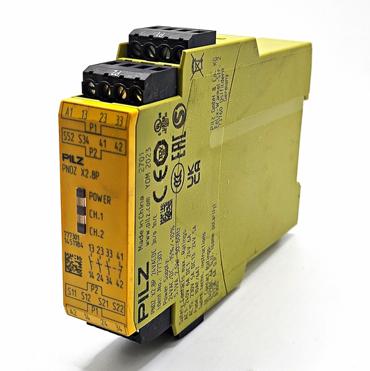 Pilz 777301 PNOZ X2.8P safety relay 24VAC/DC 3 N/O 1 N/C for E-STOP and safety gate monitoring in industrial machinery