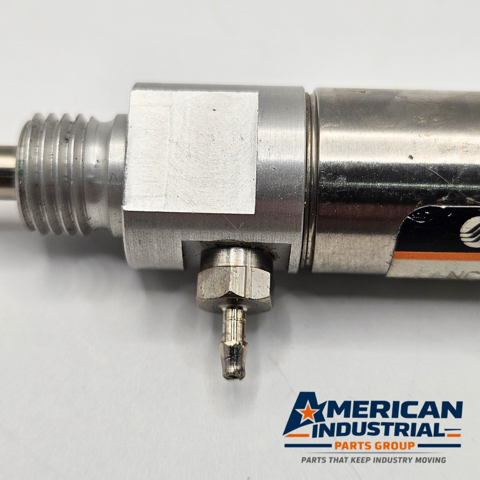 SMC NCME056-0100 pneumatic air cylinder for industrial automation and MRO applications. American Industrial Parts Group.