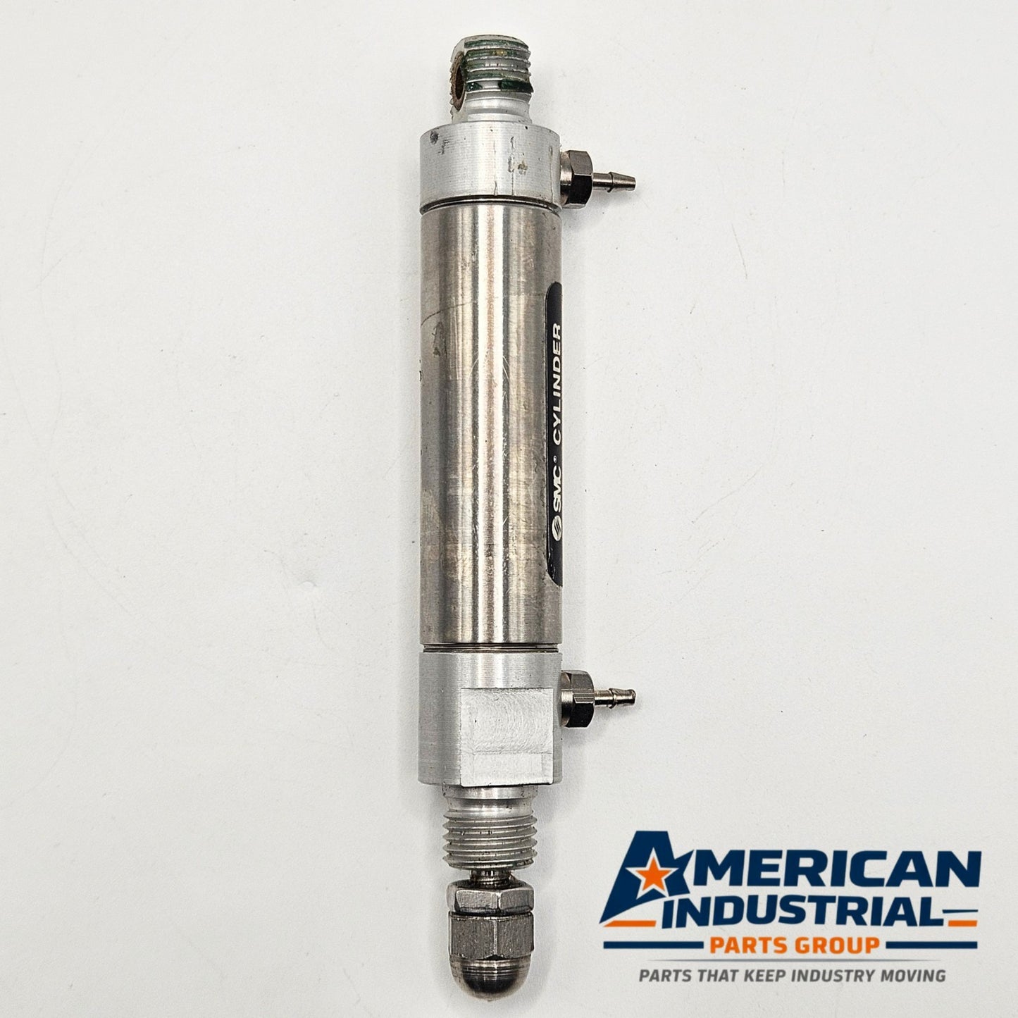 SMC NCME056-0100 pneumatic air cylinder for industrial automation and MRO applications. American Industrial Parts Group.