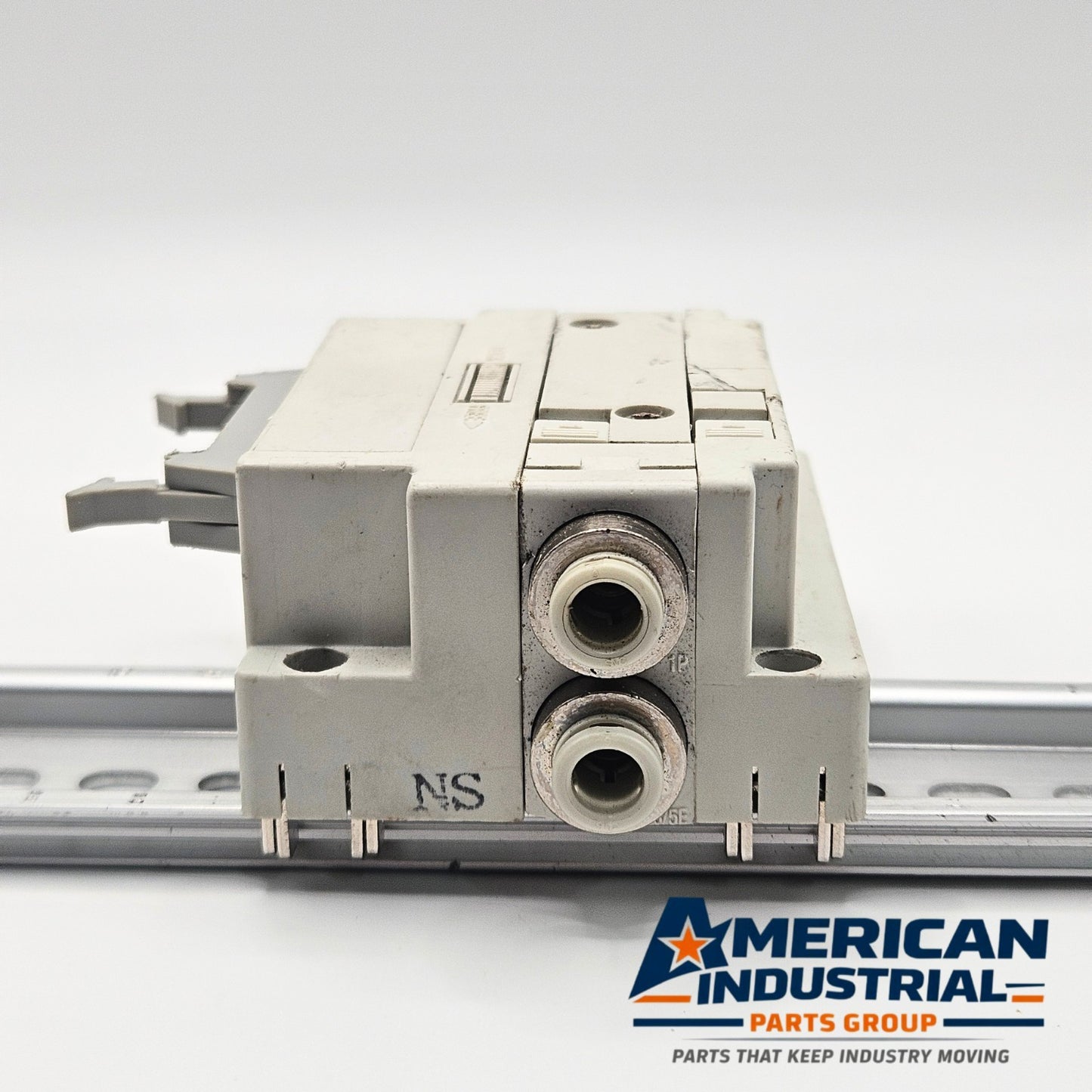 SMC pneumatic valve manifold end block assembly view, industrial automation MRO pneumatic manifold end component. American Industrial Parts Group.