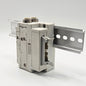 SMC pneumatic valve manifold end block overview image, industrial automation MRO pneumatic manifold component. American Industrial Parts Group.