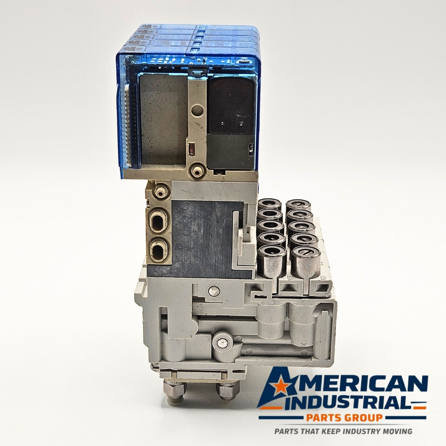 SMC SJ3160T-5CZ-M5-X20 pneumatic solenoid valve manifold label detail, industrial automation MRO air valve component. American Industrial Parts Group.