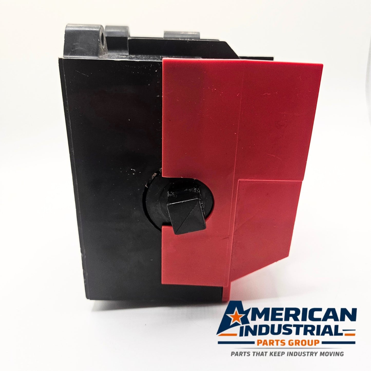 Square D red and black safety switch for industrial electrical panels. American Industrial Parts Group.