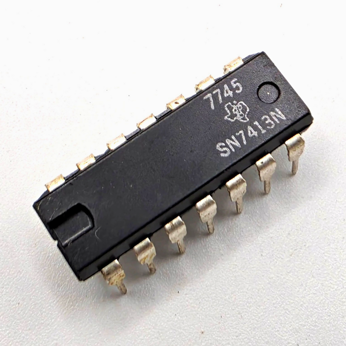 Texas Instruments SN7413N dual 4-input NAND Schmitt trigger TTL DIP-14 for vintage logic repair from American Industrial Parts Group
