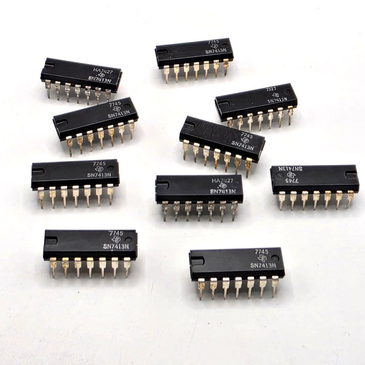 Lot of 10 Texas Instruments SN7413N dual 4-input NAND Schmitt triggers TTL DIP-14 for vintage logic repair from American Industrial Parts Group