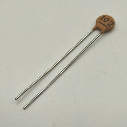 Lot of 25 unbranded 0.001uF 1nF 1000pF 102 ceramic disc capacitors radial lead for tone control, bypass, and circuit board repair