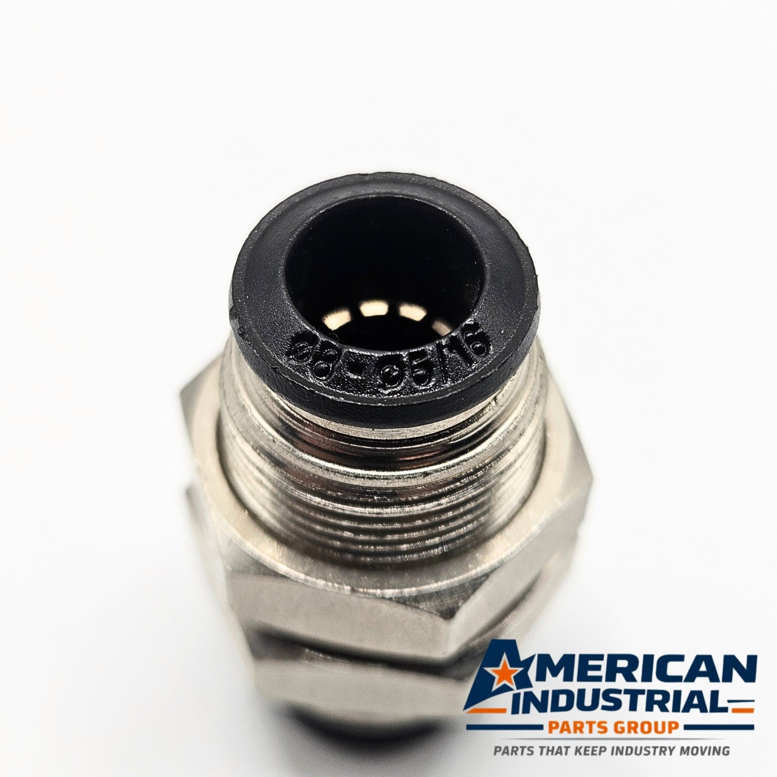 Unbranded inline pneumatic bulkhead coupler used in air control panels. American Industrial Parts Group.
