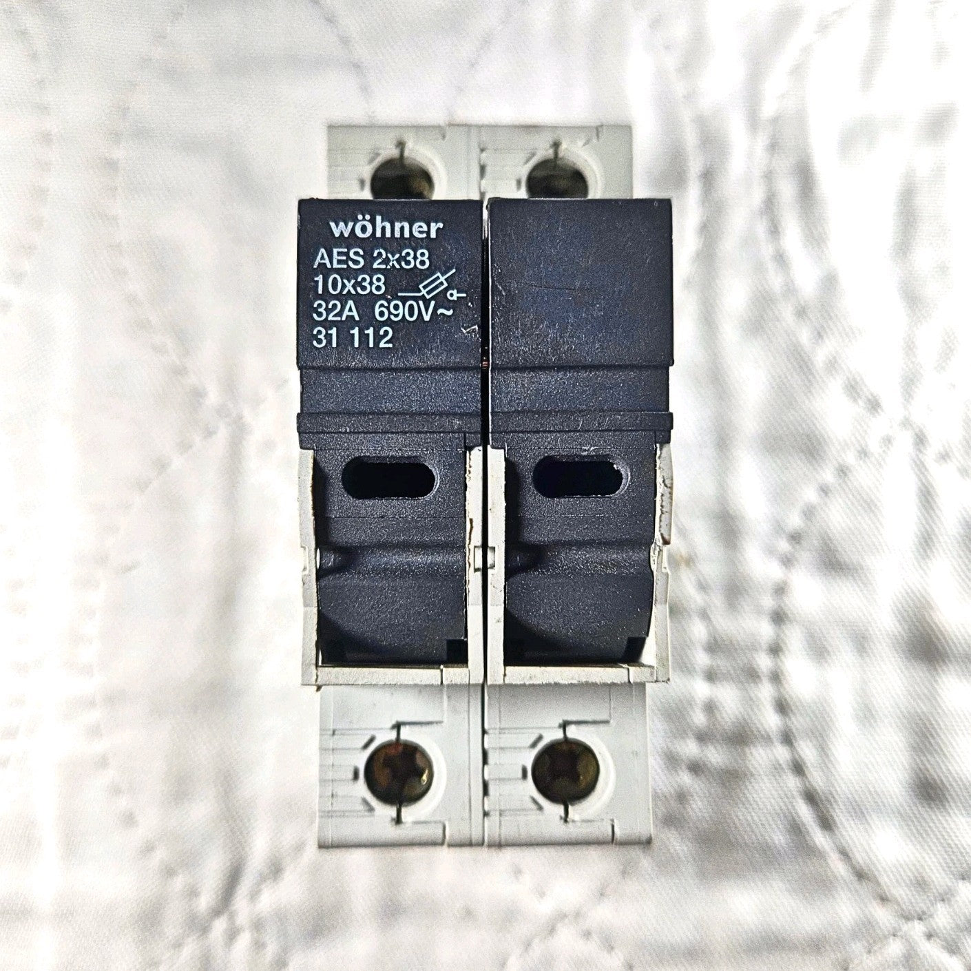 Wöhner 31112 AES 2x38 fuse holder for industrial automation and MRO applications. American Industrial Parts Group.