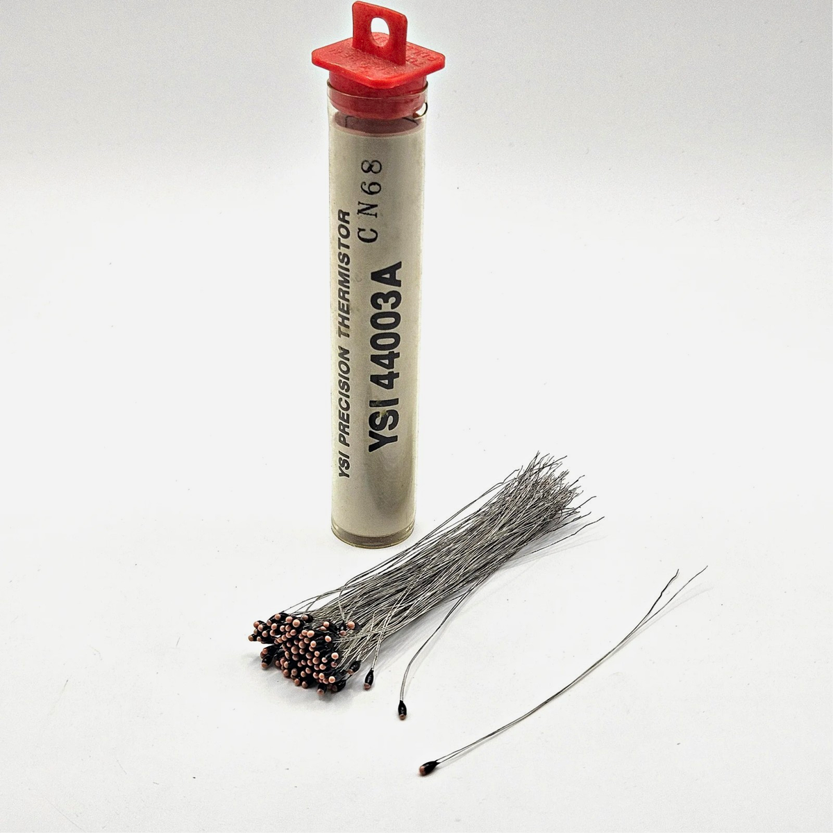 Lot of 100 YSI 44003A precision NTC thermistors 1000 ohm at 25C with 32 AWG leads for temperature measurement and instrumentation